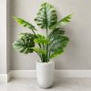 Cây trầu bà giả lá xẻ monstera cao 1m3 chậu sứ trắng tinh tế trang trí mọi không gian