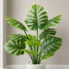 Cây trầu bà giả lá xẻ monstera cao 1m3 chậu sứ trắng tinh tế trang trí mọi không gian