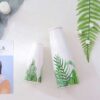 Bình gốm trắng hình lá 4